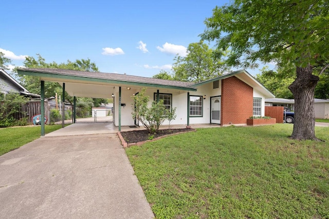 8309 Burrell Dr, Austin, TX 78757 - view of front of house with concrete driveway and an attached carport