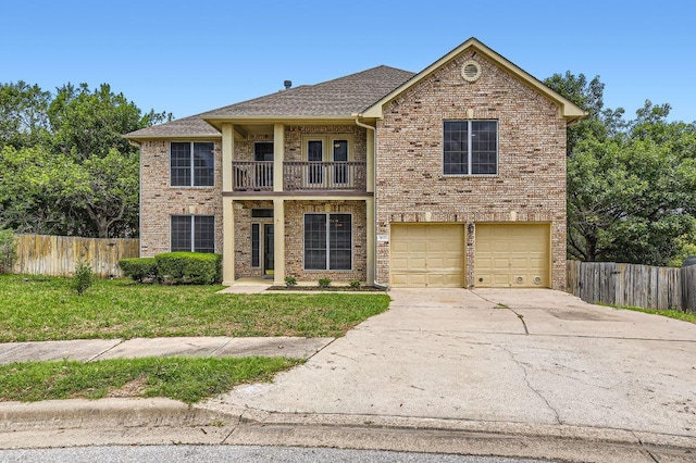 view of front of house with a balcony, driveway, an attached garage, brick siding, and a shingled roof