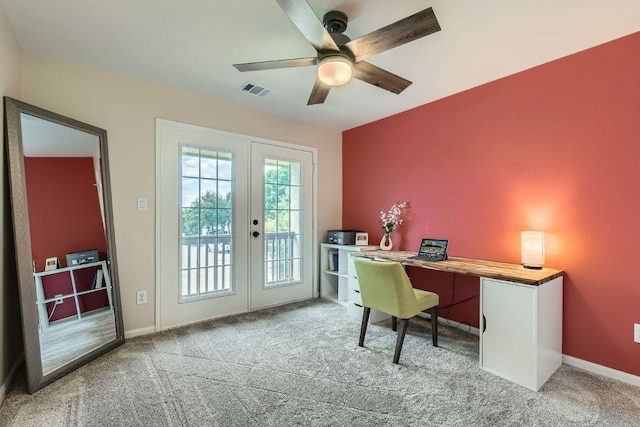 office space with french doors, carpet flooring, a ceiling fan, and baseboards