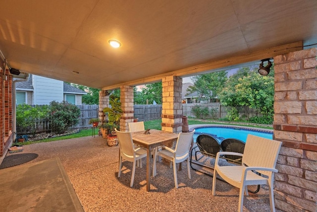 view of patio / terrace with a fenced backyard and outdoor dining space