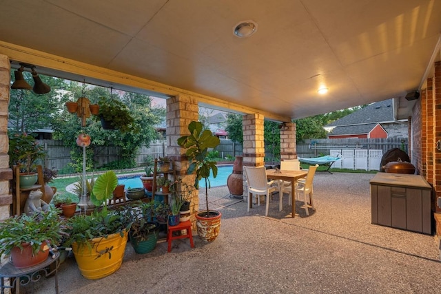 view of patio / terrace featuring outdoor dining area and a fenced backyard