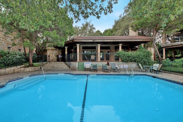1000 Liberty Park Dr Unit 205, Austin, TX 78746 - community pool featuring a patio