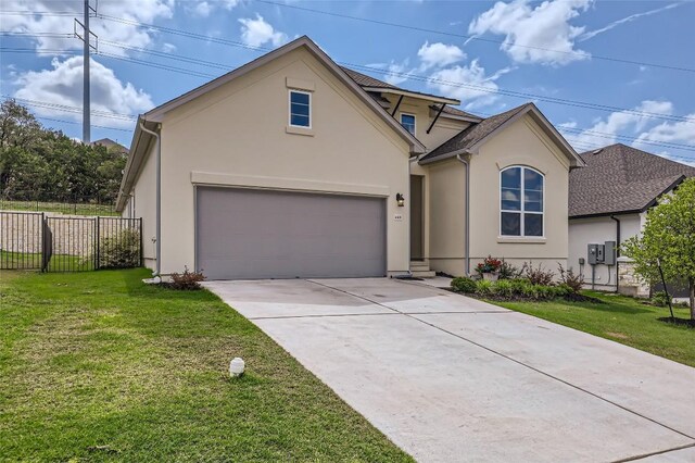 4608 Modena Bay Bnd, Leander, TX 78641 - traditional-style house with stucco siding and concrete driveway