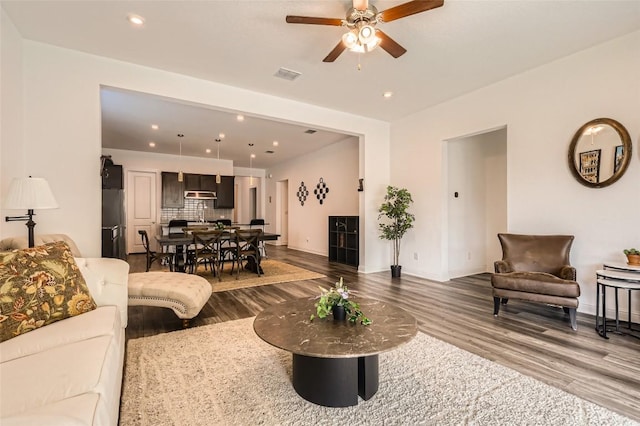 4608 Modena Bay Bnd, Leander, TX 78641 - living room featuring wood finished floors, ceiling fan, and recessed lighting