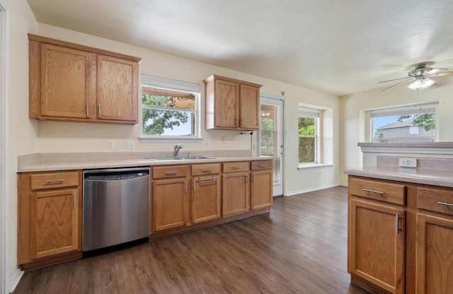 13306 James Monroe St, Manor, TX 78653 - kitchen with dishwasher, a sink, dark wood finished floors, light countertops, and ceiling fan