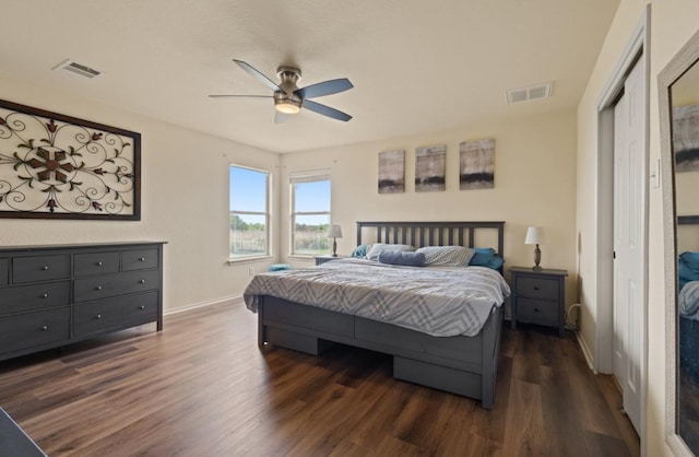 13306 James Monroe St, Manor, TX 78653 - bedroom featuring dark wood-type flooring, baseboards, and a ceiling fan