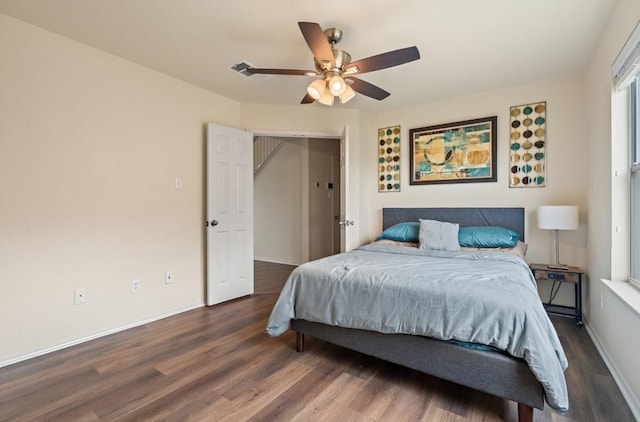 13306 James Monroe St, Manor, TX 78653 - bedroom with wood finished floors, baseboards, and ceiling fan