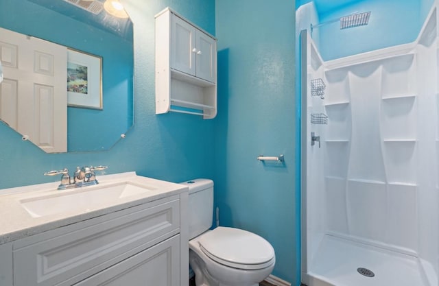 13306 James Monroe St, Manor, TX 78653 - full bathroom featuring a shower stall, toilet, and vanity