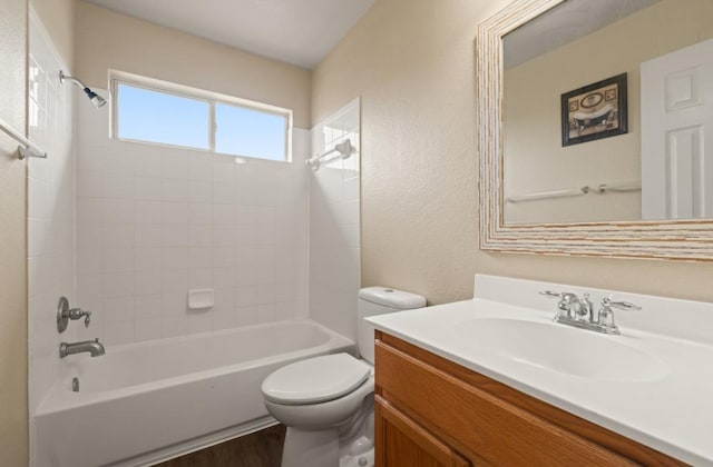13306 James Monroe St, Manor, TX 78653 - full bath with vanity, toilet, shower / bathtub combination, and wood finished floors