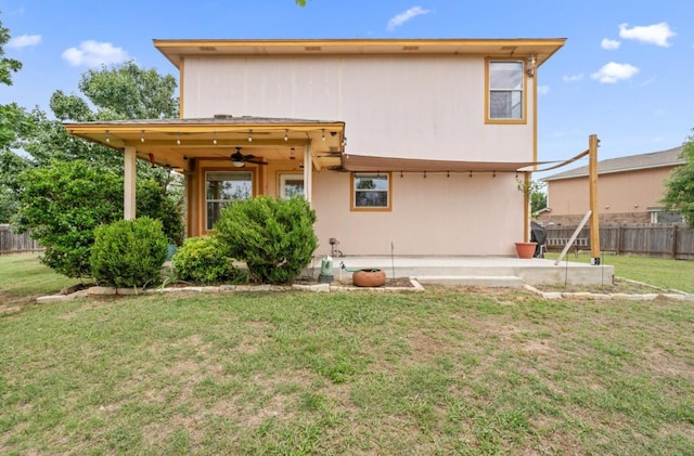 13306 James Monroe St, Manor, TX 78653 - back of house featuring ceiling fan and a patio area