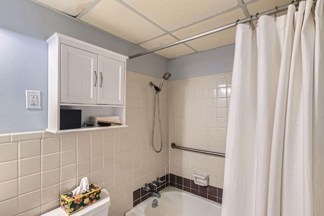1800 Lavaca St Unit A-514, Austin, TX 78701 - full bathroom featuring shower / bath combination with curtain and toilet