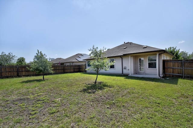 352 Voyager Cv, Kyle, TX 78640 - rear view of property featuring a patio area and roof with shingles