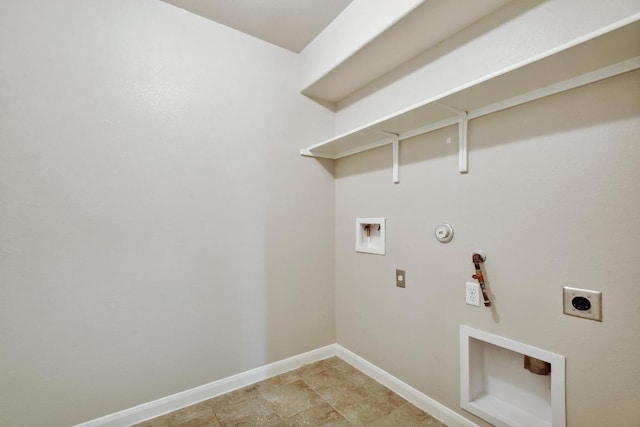 352 Voyager Cv, Kyle, TX 78640 - laundry area with hookup for a gas dryer, hookup for an electric dryer, washer hookup, and baseboards