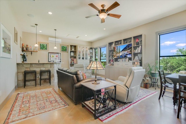 1150 Windmill Run, Wimberley, TX 78676 - tiled living area with a ceiling fan and recessed lighting