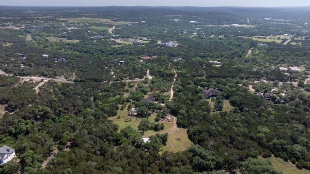 325 Onion Creek Ranch Rd, Driftwood, TX 78619 - aerial view of property and surrounding area with a heavily wooded area