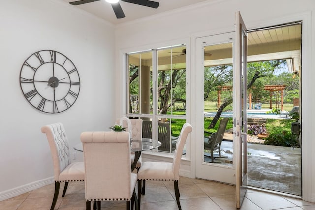 325 Onion Creek Ranch Rd, Driftwood, TX 78619 - dining area with a ceiling fan, crown molding, and light tile patterned flooring