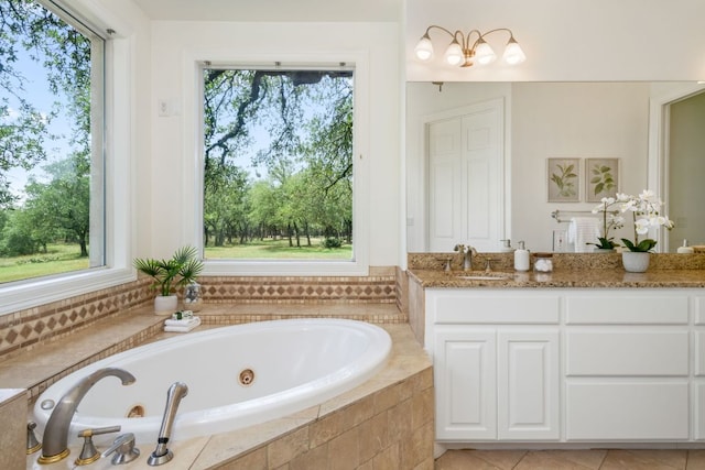 325 Onion Creek Ranch Rd, Driftwood, TX 78619 - bathroom featuring a jetted tub and vanity