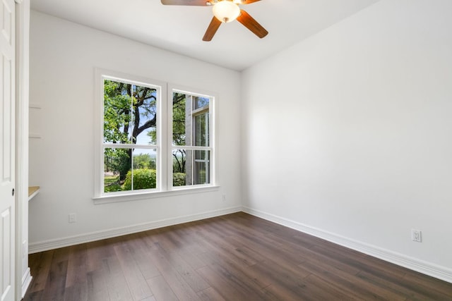 325 Onion Creek Ranch Rd, Driftwood, TX 78619 - empty room with ceiling fan, dark wood finished floors, and baseboards