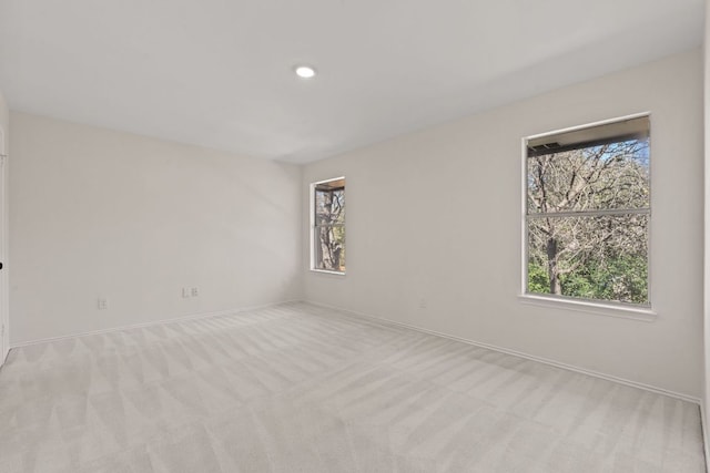 13223 Darwin Ln, Austin, TX 78729 - carpeted spare room with baseboards and recessed lighting