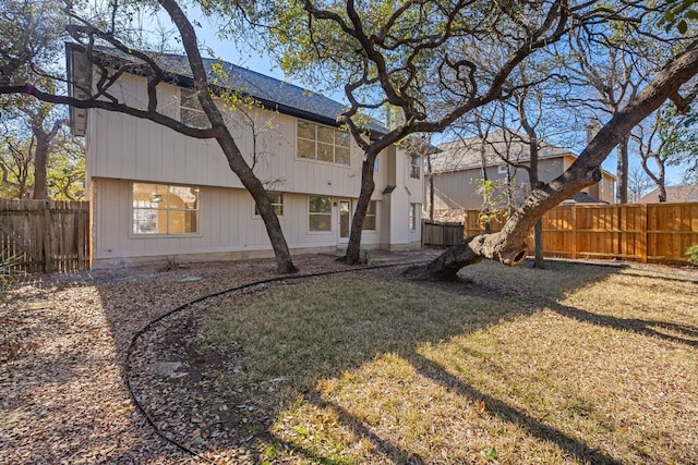 13223 Darwin Ln, Austin, TX 78729 - rear view of property featuring a fenced backyard