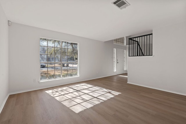 13223 Darwin Ln, Austin, TX 78729 - unfurnished room featuring wood finished floors and baseboards