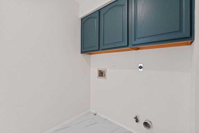 13223 Darwin Ln, Austin, TX 78729 - laundry area featuring hookup for a gas dryer, hookup for a washing machine, baseboards, electric dryer hookup, and cabinet space