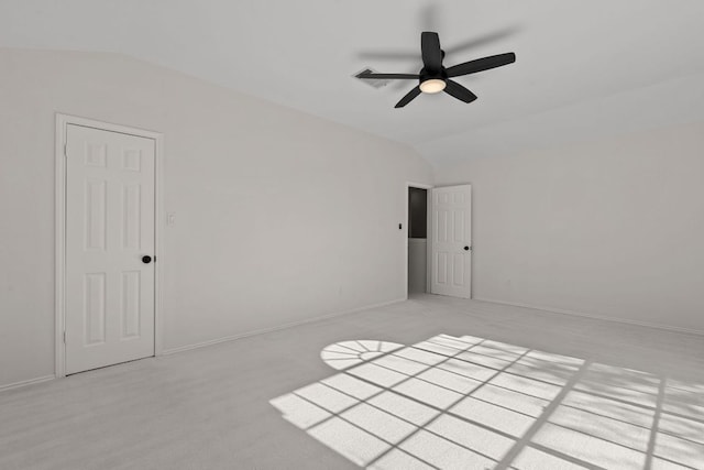 13223 Darwin Ln, Austin, TX 78729 - unfurnished room featuring lofted ceiling, a ceiling fan, light carpet, and baseboards