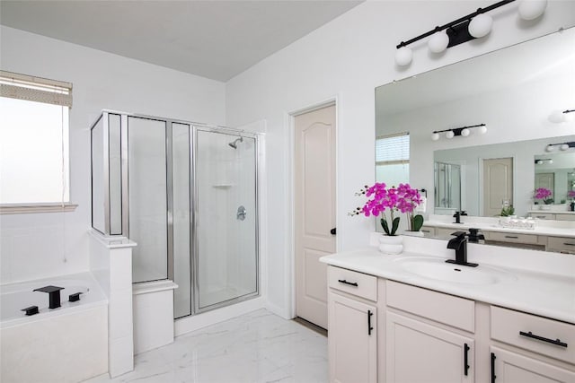 full bathroom with a shower stall, marble look tiles, vanity, and a garden tub