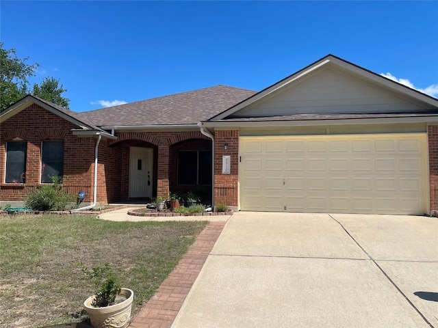 ranch-style house with brick siding, concrete driveway, a garage, roof with shingles, and a front lawn