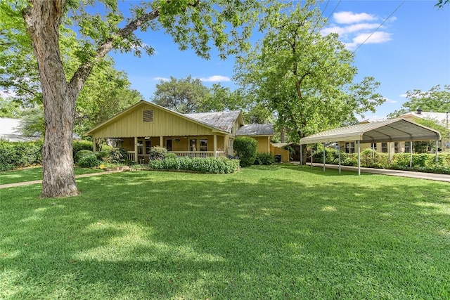 503 Colorado St, Smithville, TX 78957 - single story home with a detached carport, covered porch, and a front yard