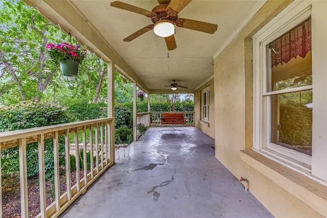 503 Colorado St, Smithville, TX 78957 - view of patio / terrace featuring a ceiling fan and a porch