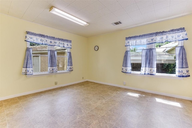 503 Colorado St, Smithville, TX 78957 - spare room featuring baseboards