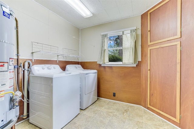 503 Colorado St, Smithville, TX 78957 - laundry area with independent washer and dryer and strapped water heater