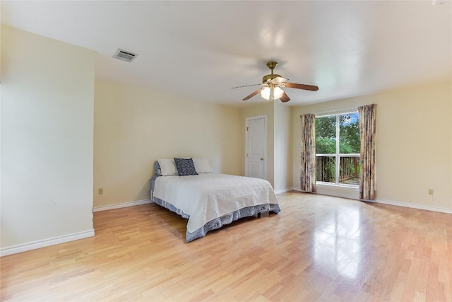 503 Colorado St, Smithville, TX 78957 - bedroom with light wood finished floors and ceiling fan