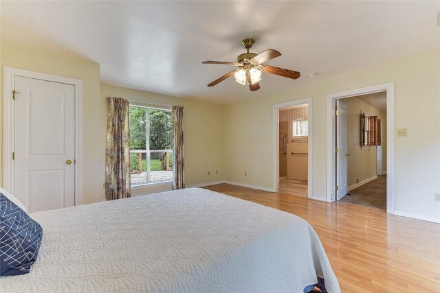503 Colorado St, Smithville, TX 78957 - bedroom featuring light wood-type flooring, baseboards, and ceiling fan