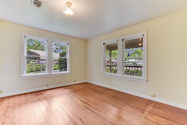 503 Colorado St, Smithville, TX 78957 - spare room with baseboards and light wood finished floors