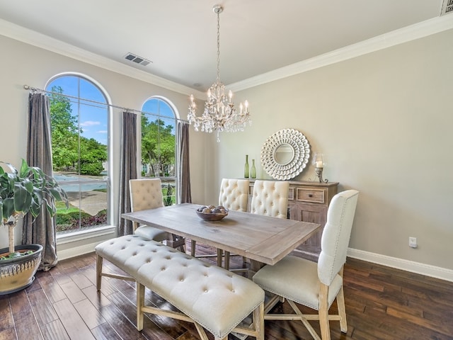 11701 Hunters Green Trl, Austin, TX 78732 - dining space with a chandelier, crown molding, baseboards, and dark wood-style flooring