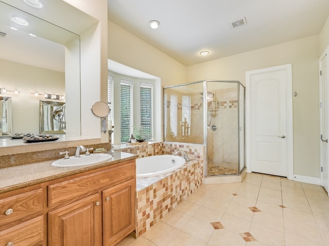 11701 Hunters Green Trl, Austin, TX 78732 - full bathroom with a bath, tile patterned flooring, a shower stall, and vanity