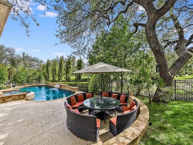 11701 Hunters Green Trl, Austin, TX 78732 - view of swimming pool featuring a patio, fence, a pool with connected hot tub, and outdoor dining area