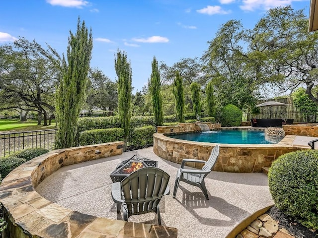 11701 Hunters Green Trl, Austin, TX 78732 - view of patio / terrace with a fire pit and a fenced backyard