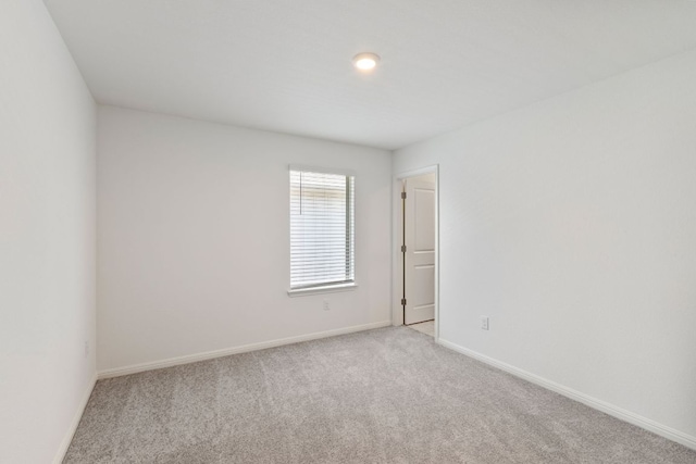 615 Backstays Loop, Kyle, TX 78640 - empty room featuring light carpet and baseboards