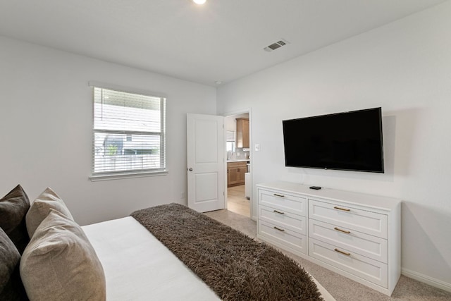 615 Backstays Loop, Kyle, TX 78640 - bedroom with light colored carpet and baseboards