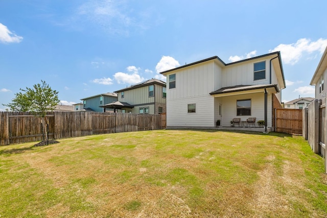 615 Backstays Loop, Kyle, TX 78640 - rear view of property with a patio area and board and batten siding