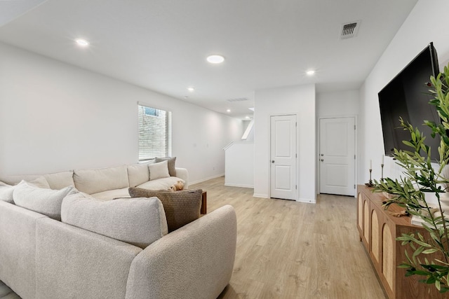 615 Backstays Loop, Kyle, TX 78640 - living room with light wood finished floors, recessed lighting, and baseboards