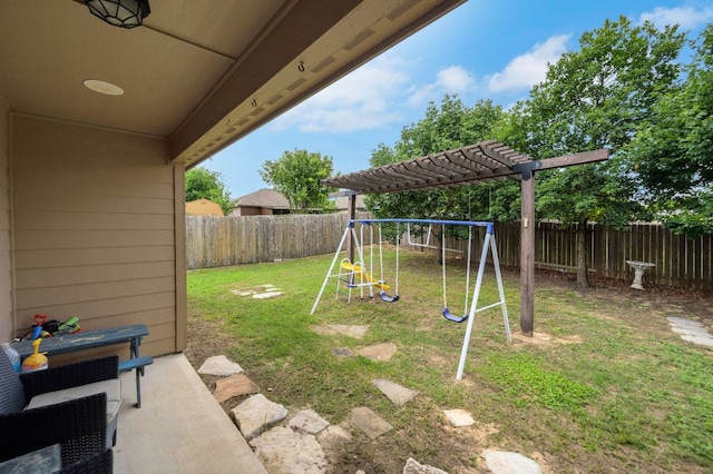 504 Sapphire Ln, Jarrell, TX 76537 - view of playground featuring a pergola