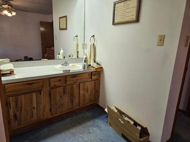 102 Stubblefield Dr, Elgin, TX 78621 - bathroom with vanity, a ceiling fan, and baseboards