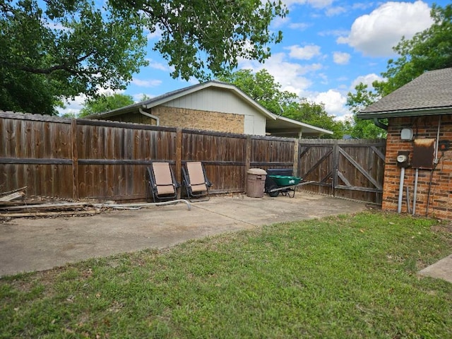 102 Stubblefield Dr, Elgin, TX 78621 - view of yard featuring a patio area and a gate