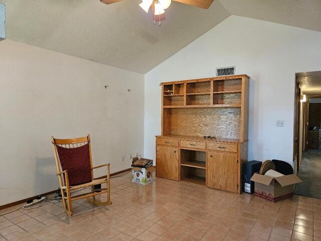 102 Stubblefield Dr, Elgin, TX 78621 - living area with ceiling fan and high vaulted ceiling