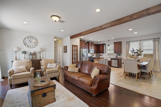 168 Pearl Way, Buda, TX 78610 - living area with recessed lighting, light wood-style floors, and beamed ceiling