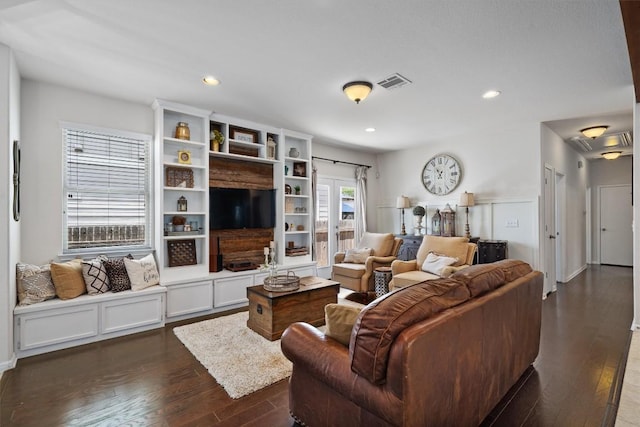 168 Pearl Way, Buda, TX 78610 - living room featuring dark wood-style flooring and recessed lighting